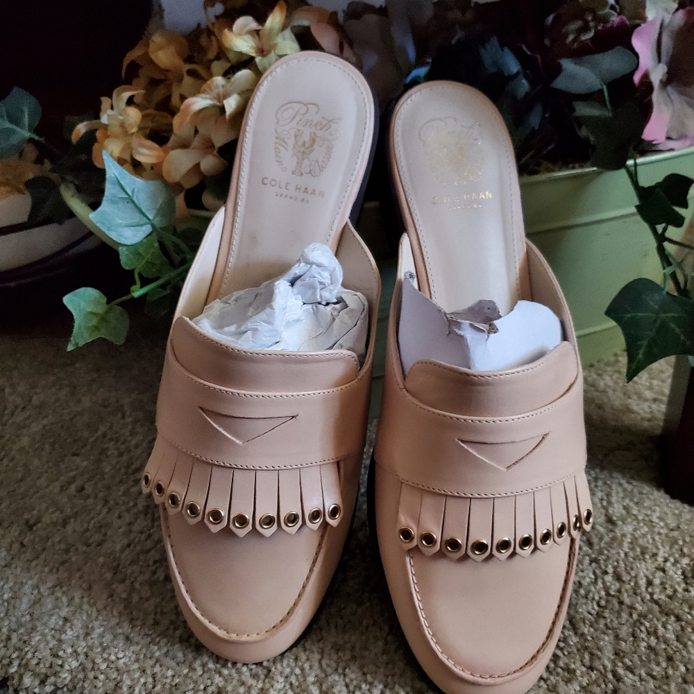 Brand new blush mules,leather